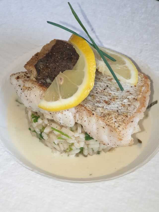 Risotto aux herbes et pavé de poisson.