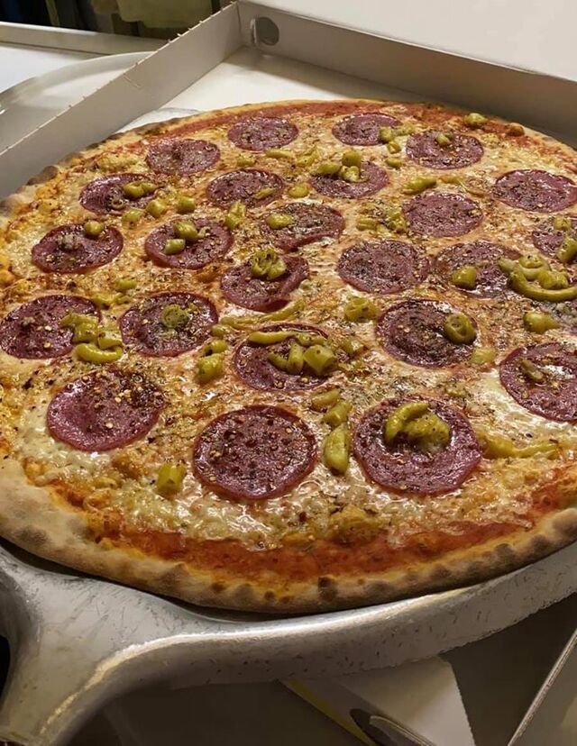 Familienpizza zum Mitnehmen