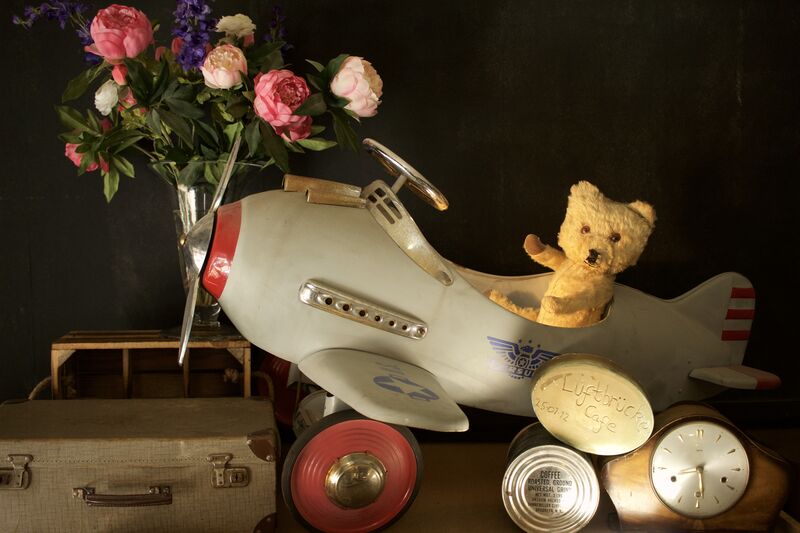 Just a picture of a rescued bear flying in an airplane, with some coffee from the airlift of 1948.