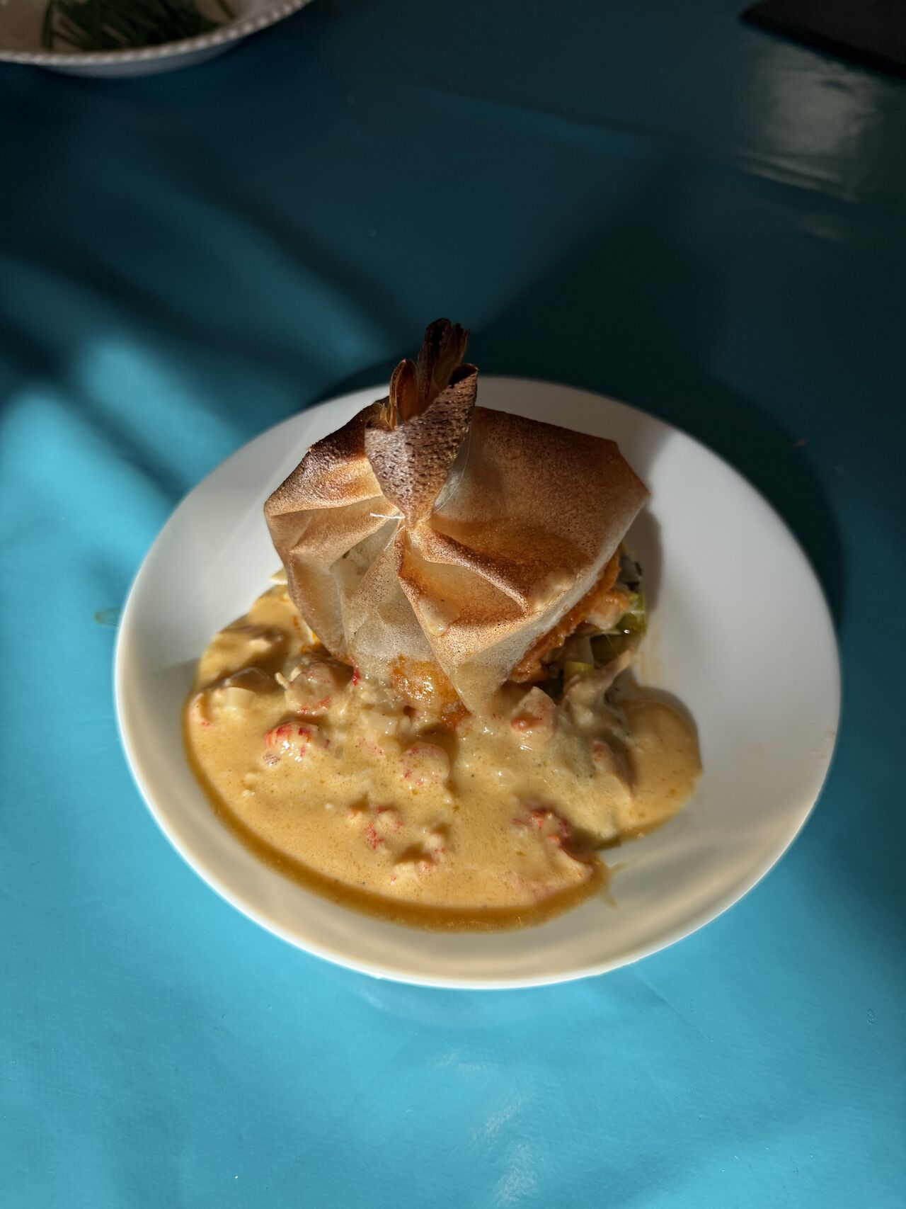 Aumônières de St Jacques Coeur fondue de poireaux et patates douces sur nage d’écrevisses ❤️