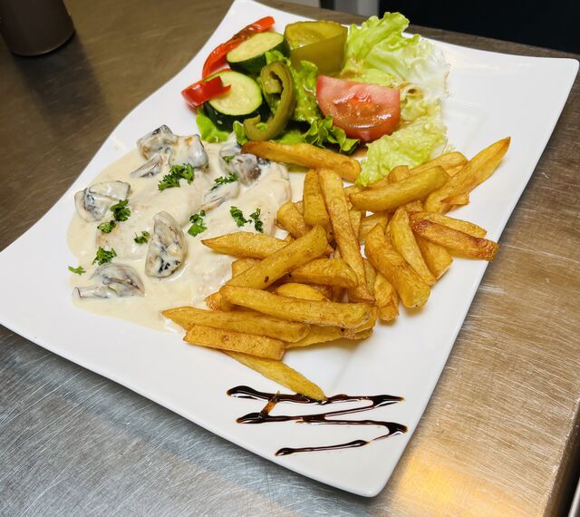 Escalope de poulet à la crème de champignons