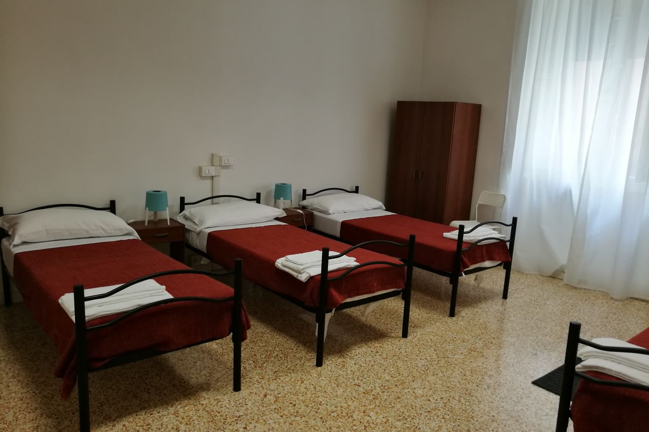 Camera Quadrupla con bagno condiviso