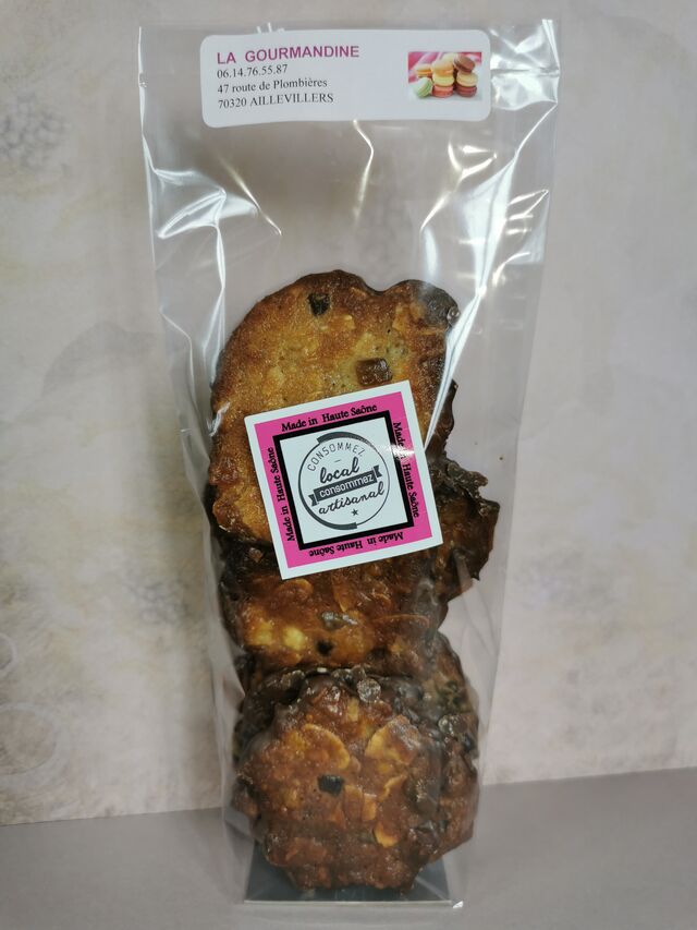 Florentins 140g 8.40€ Biscuits caramélisés à base d'amandes et de fruits confits, le tout glacé de chocolat au lait. 