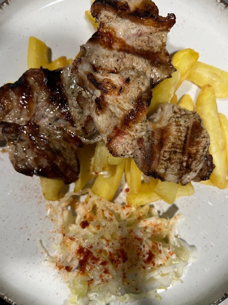 Secreto de cerdo a la brasa