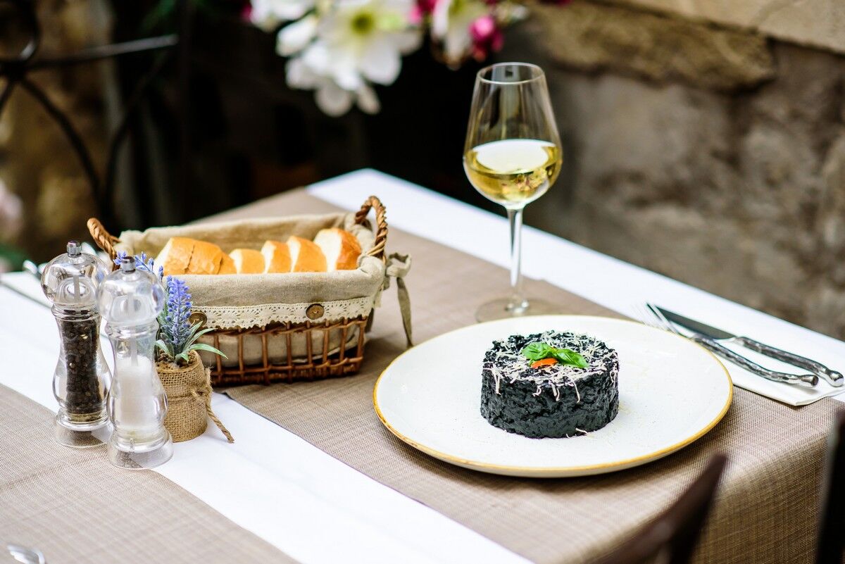 Traditional homemade Croatian cuisine - Black risotto 