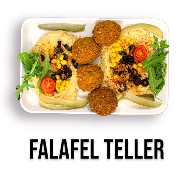 Falafel Hummus und pommes Tellern