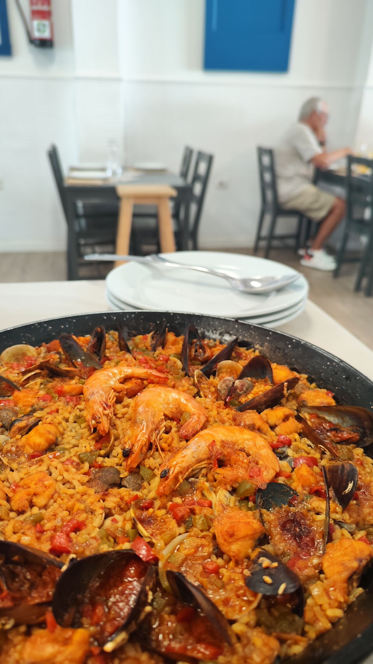 Paella de pescado y mariscos