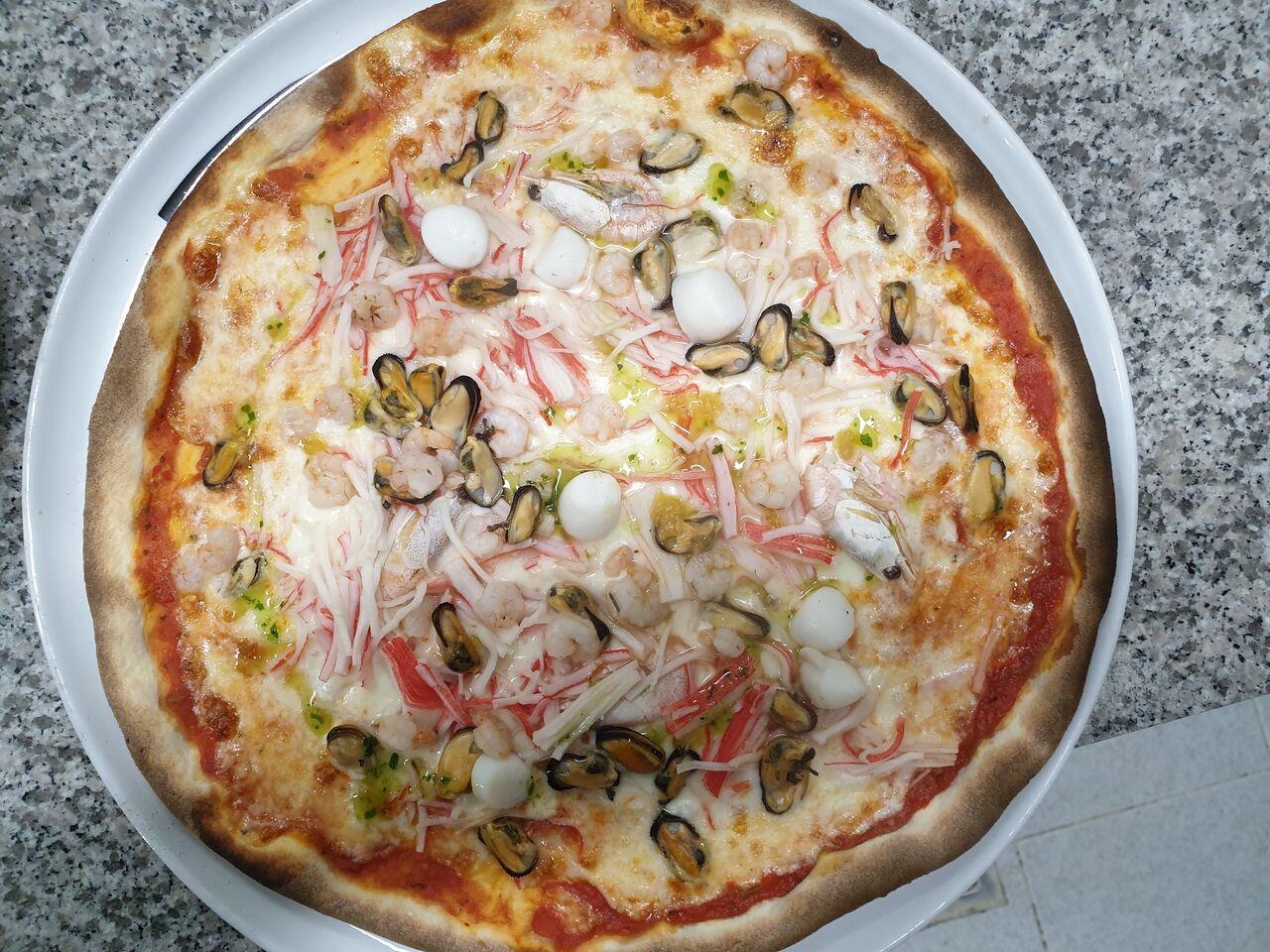 Pizza frutti di mare kan met look ook zijn