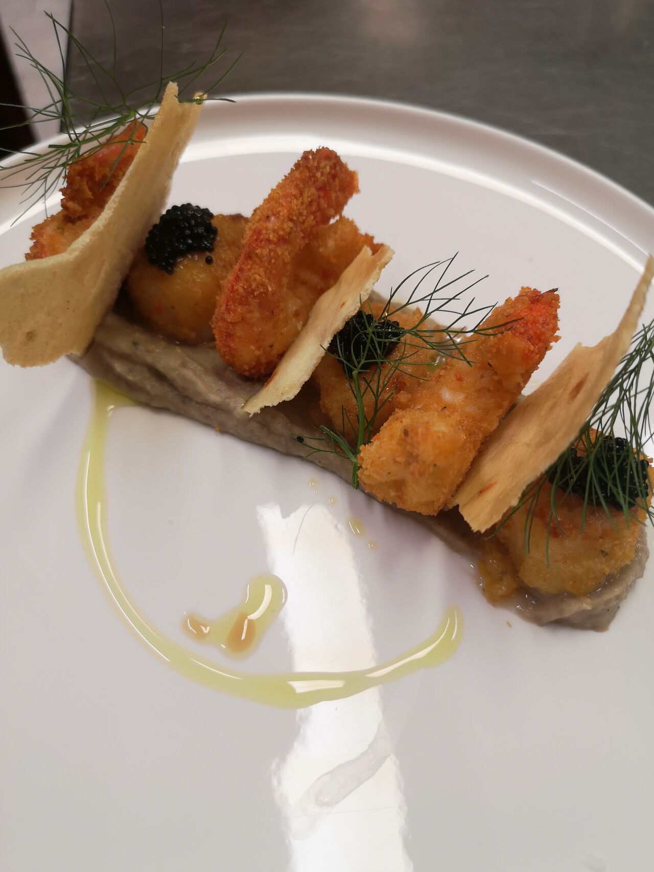 Capesante, gamberi, melanzana