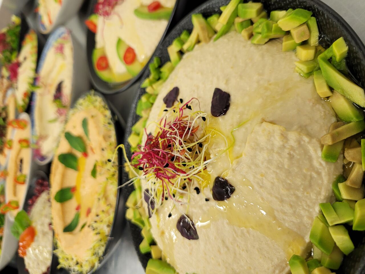 Houmous (Purée de pois chiche, crème de sésame, citron, huile d'olive)