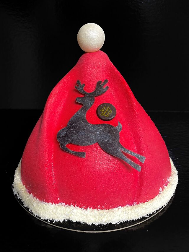 Mousse fromage blanc à la vanille et crémeux fraise pour le bonnet du Père Noël.