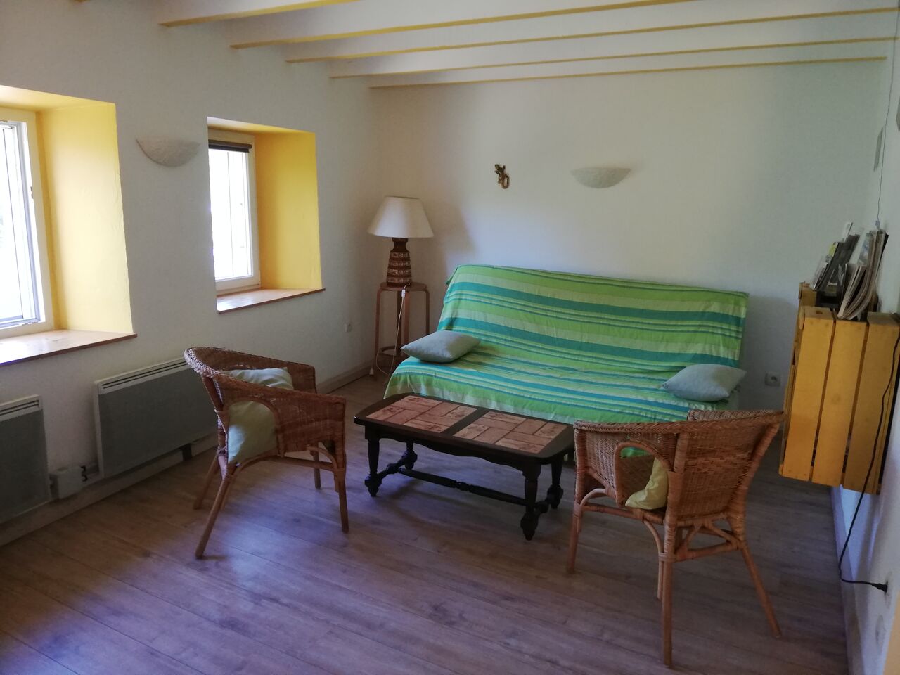 Salon avec canapé lit 