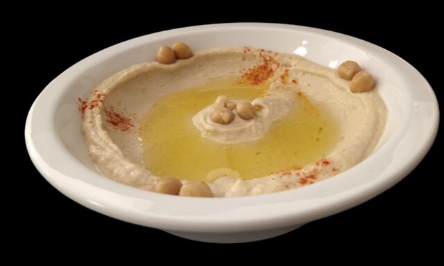 Houmous
Purée de pois chiche à la crème de sésame avec de l'huile d’olive.