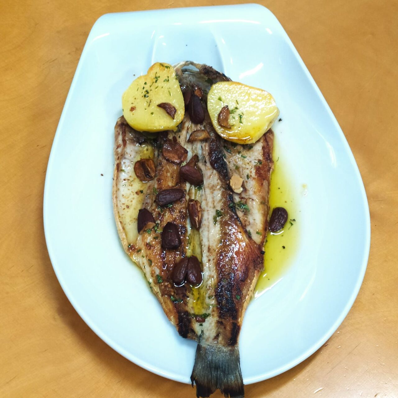 Lubina a la Espalda