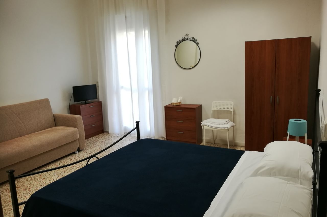 Camera Tripla Basic con bagno condiviso