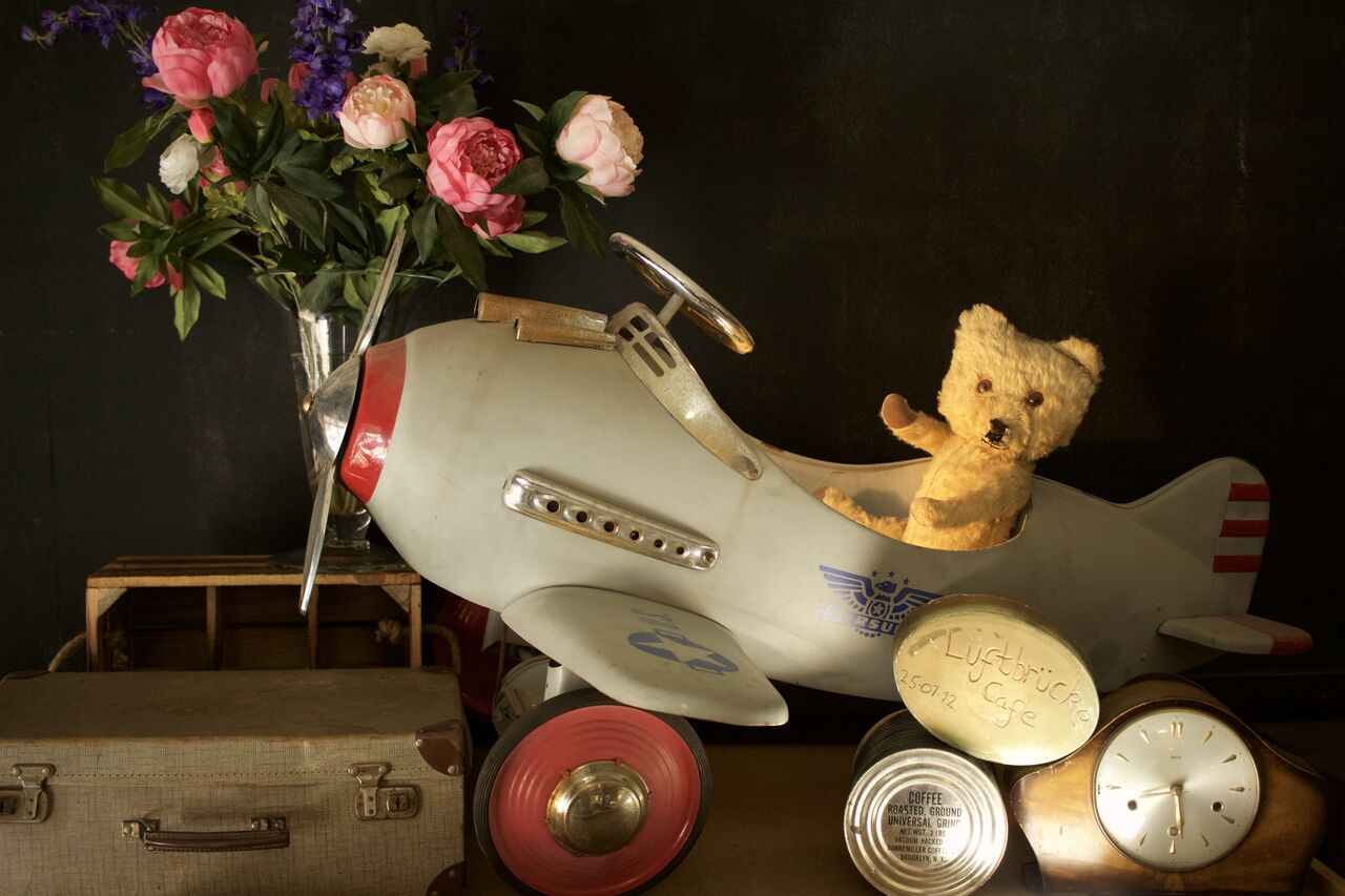 Just a picture of a rescued bear flying in an airplane, with some coffee from the airlift of 1948.