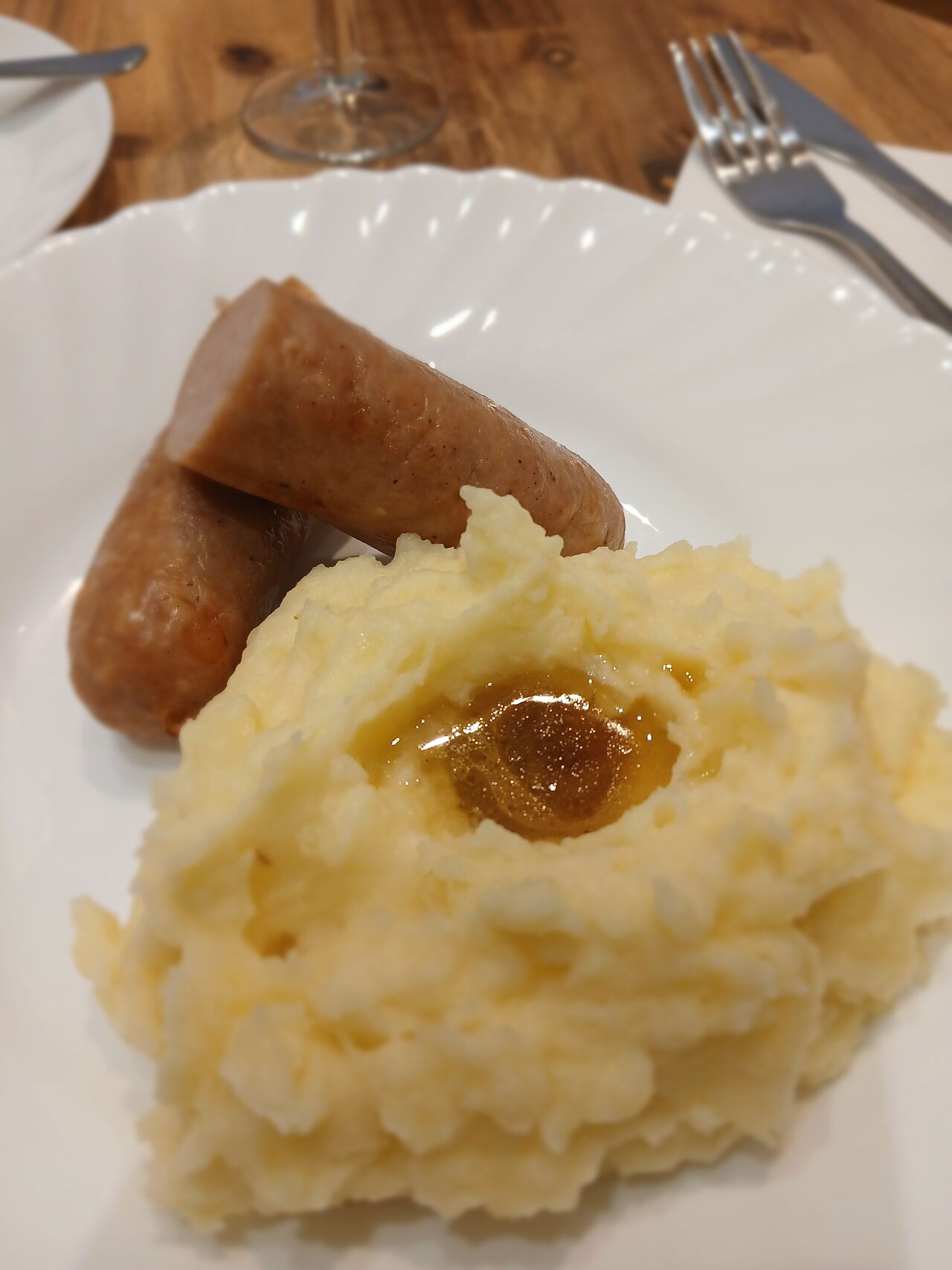 Saucisse de Toulouse purée de pommes de terre sauce brune