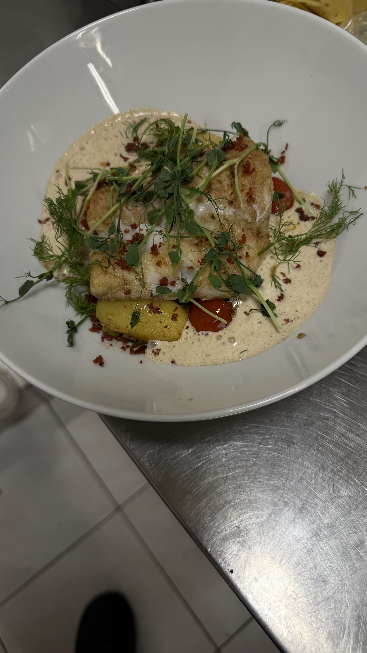 Le dos de cabillaud émulation de jambon et risotto de légumes 