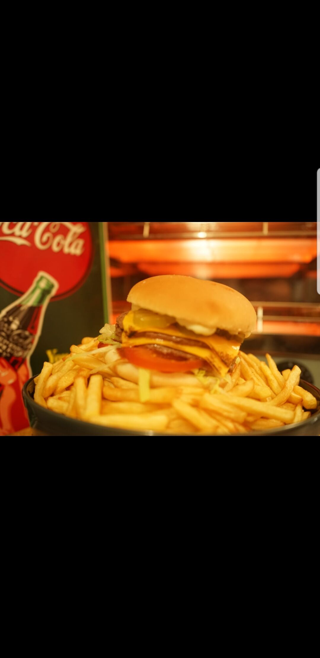 O'riginal double cheese composé de salade,tomate et oignons sauce au choix du client.