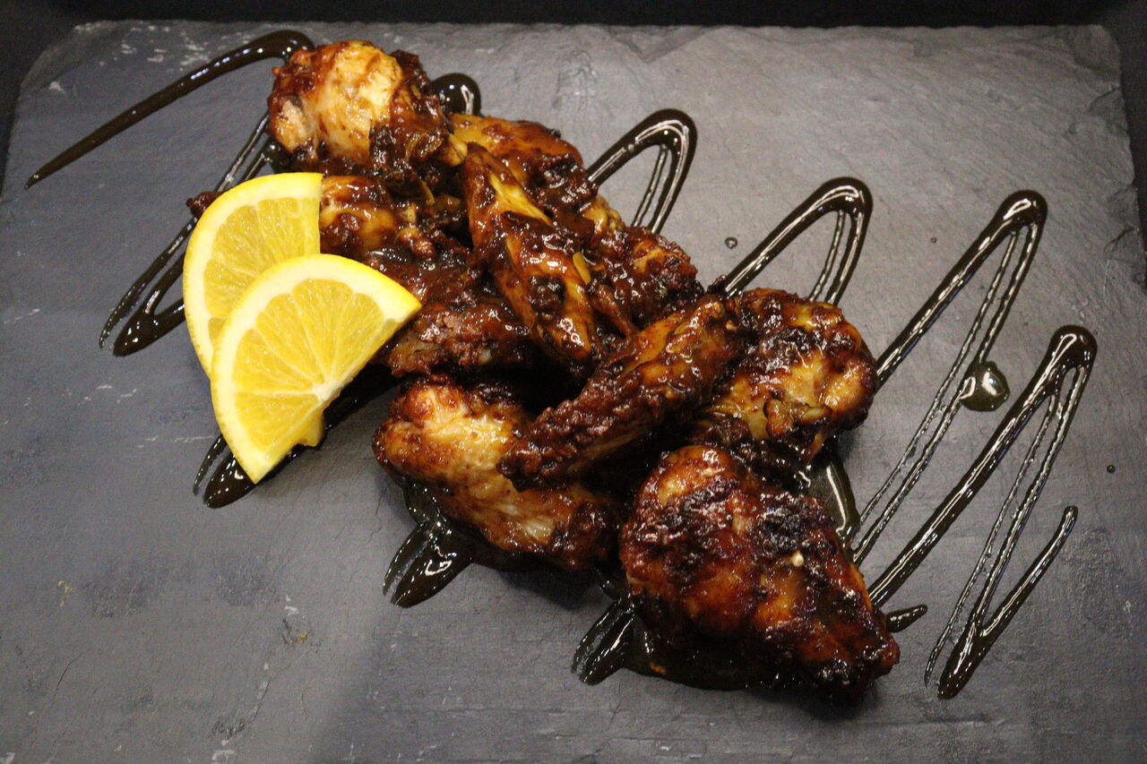 Nuestras alitas con BBQ de Naranja