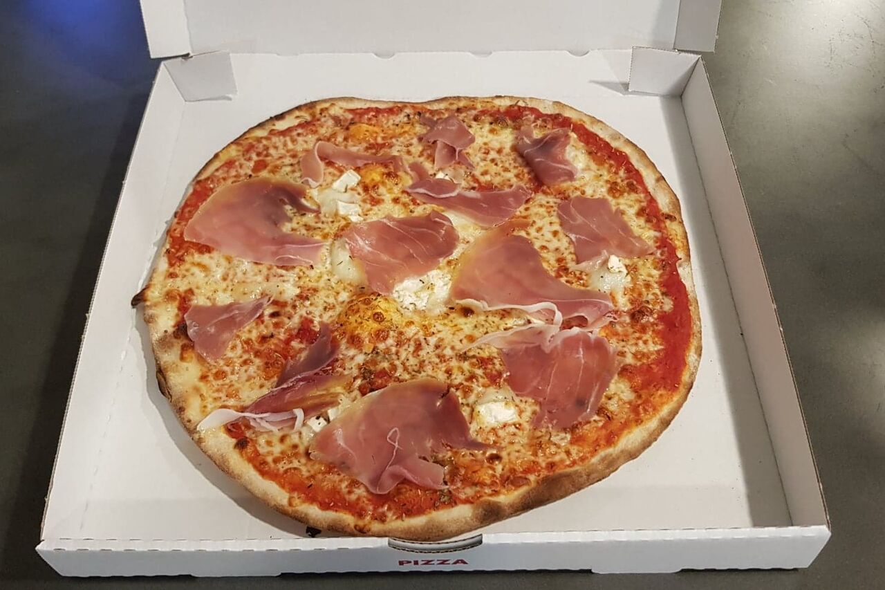 Pizza chèvre miel →