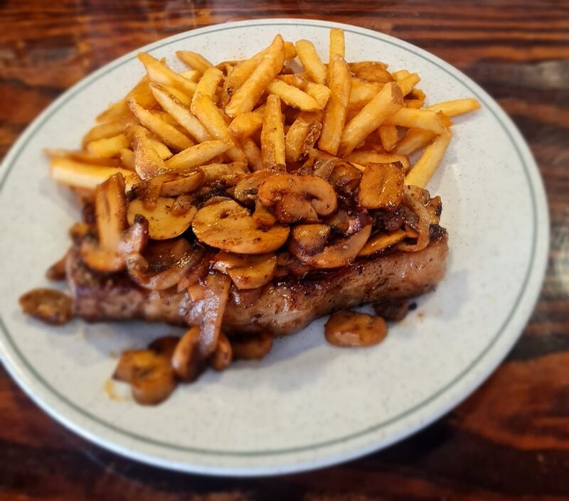 FLAT IRON STEAK TOPPED WSAUTEDD MUSHROOMS_ ONIONS