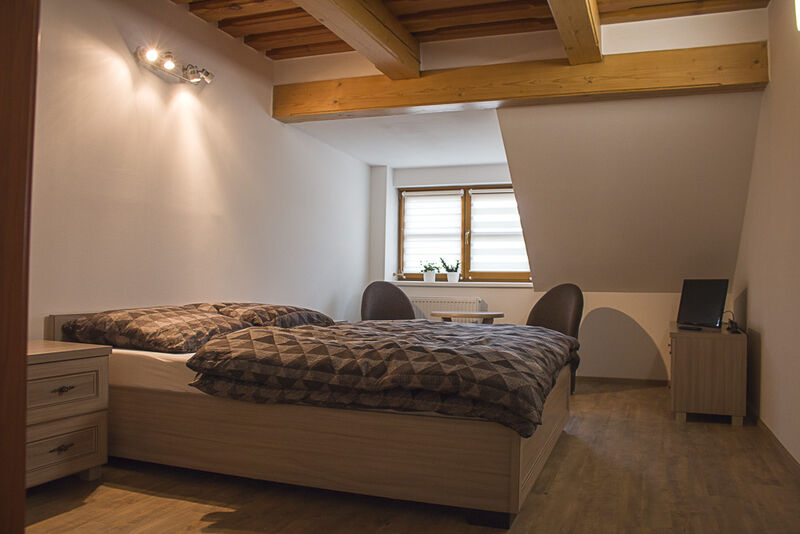 Dvoulůžkový pokoj s manželskou postelí