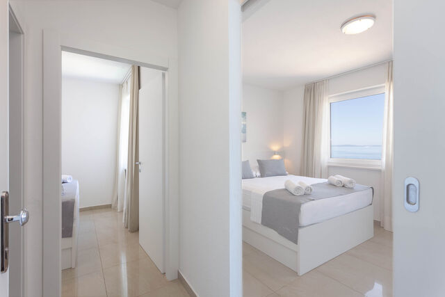 Family Quatruple Room Balcony Sea View Bedroom
