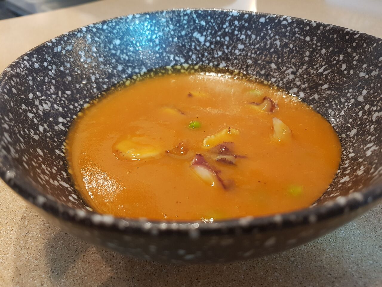 Guiso-T de pulpo