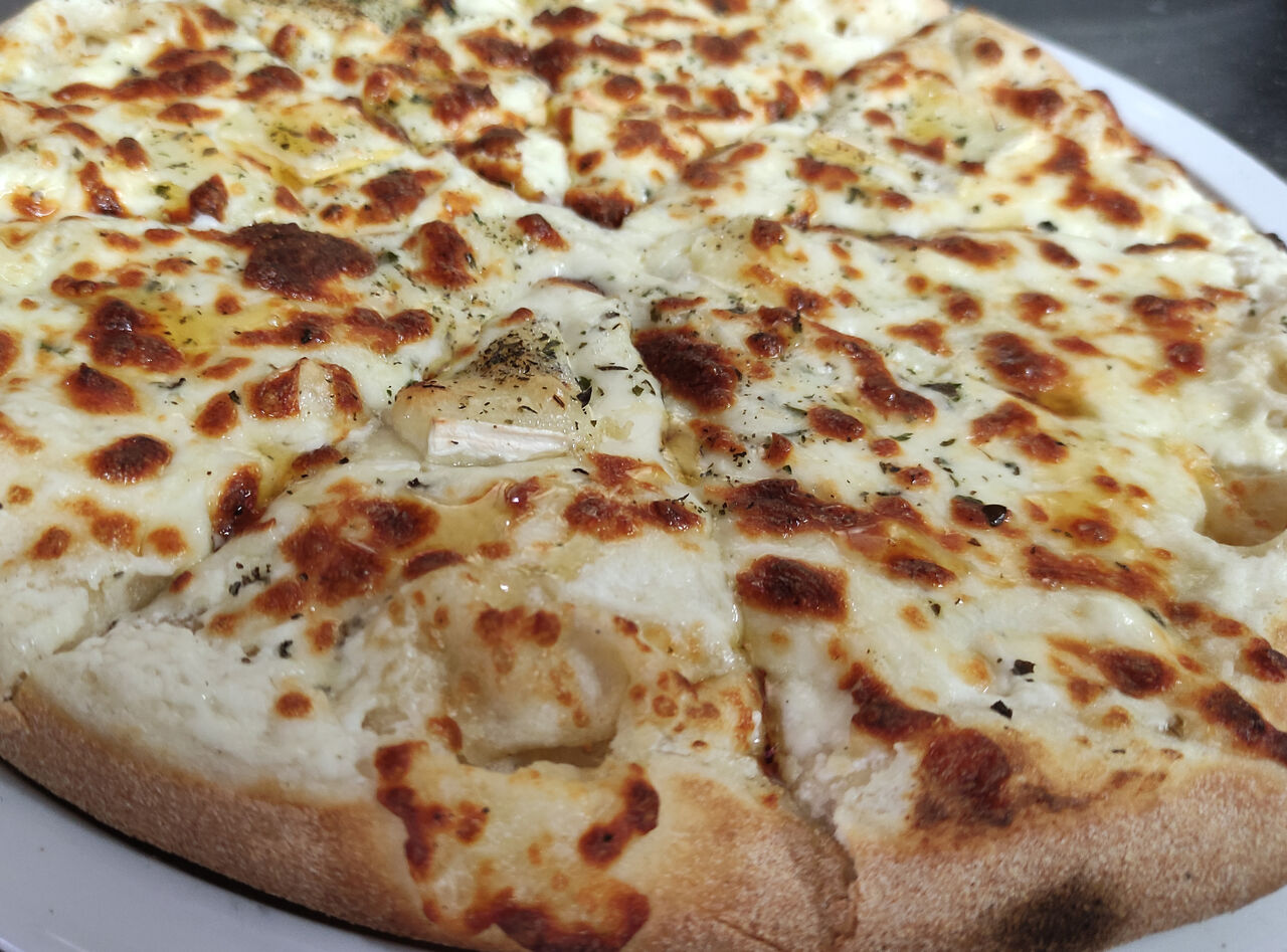 La délicieuse Pizza chèvre miel!