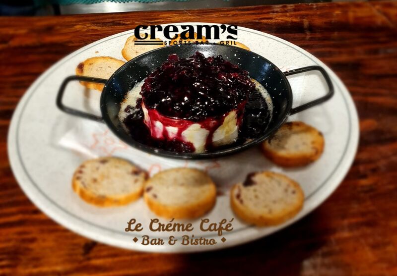 SMOKED GOAT CHEESE ROLL TOPPED W/CRANBERRY RASBERY BACON JAM