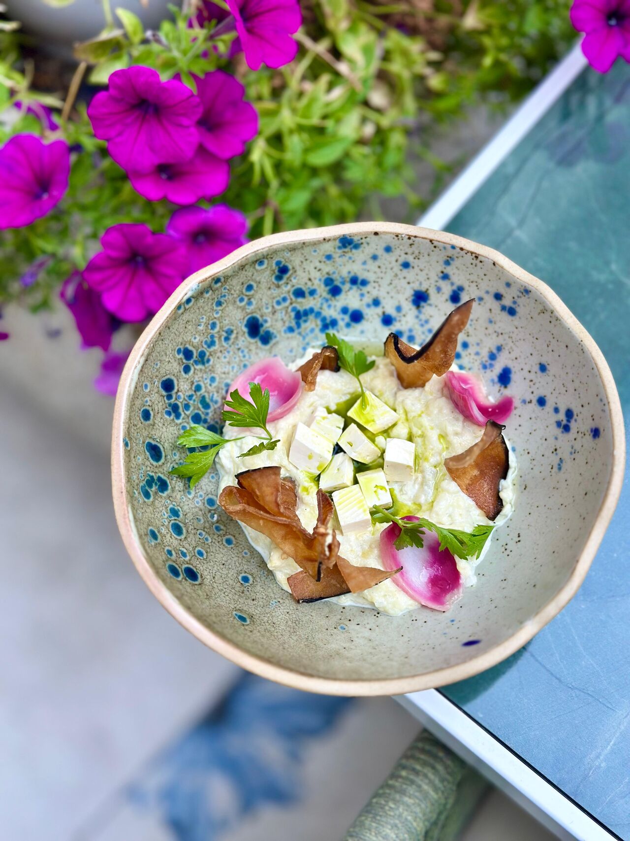Eggplant salad with feta cheese, red onion, and garlic toast