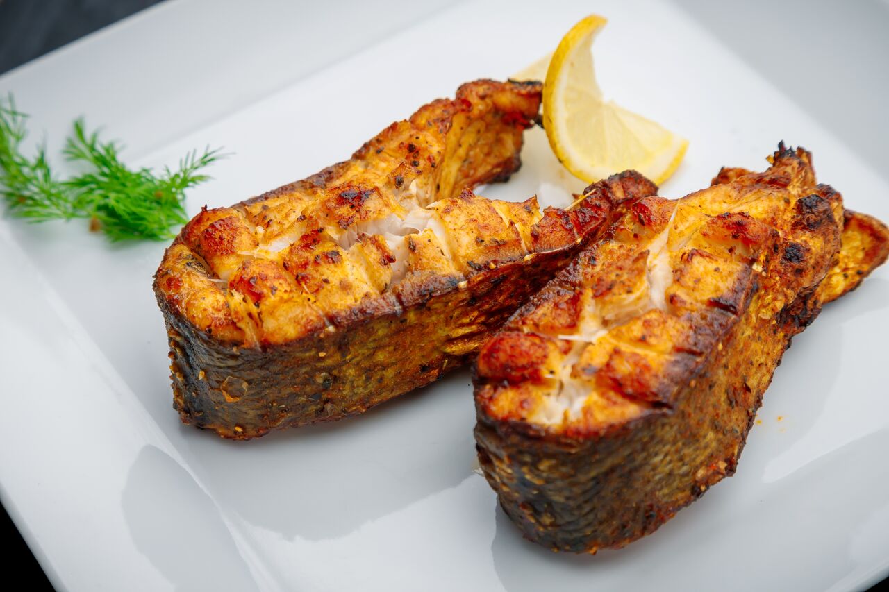 Товстолоб на мангалі