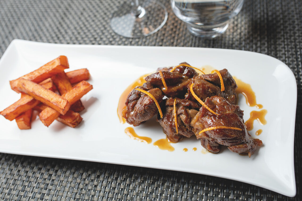 Sauté de canard aux zestes d'orange,
frites maison