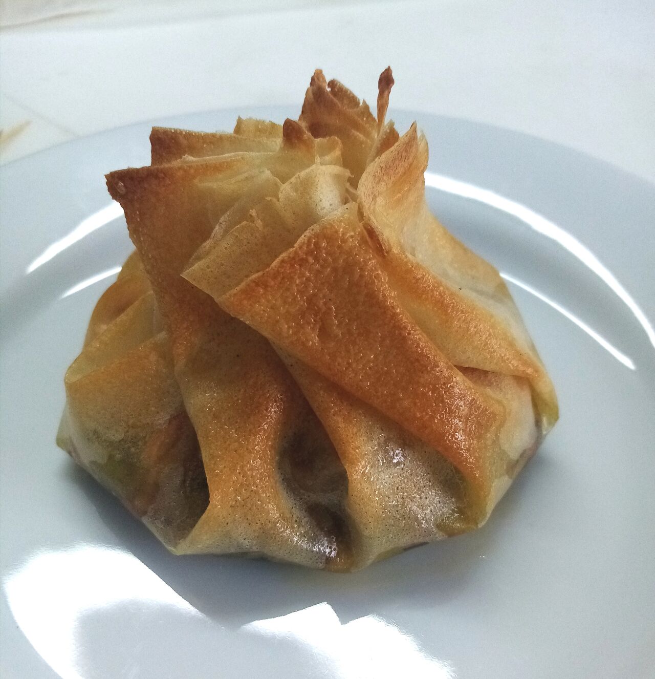 plat à emporter: brick de saumon sur lit de fondue de poreaux