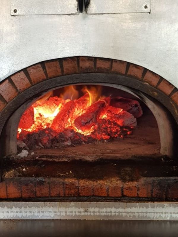 Nos viandes sont cuites au feu de bois