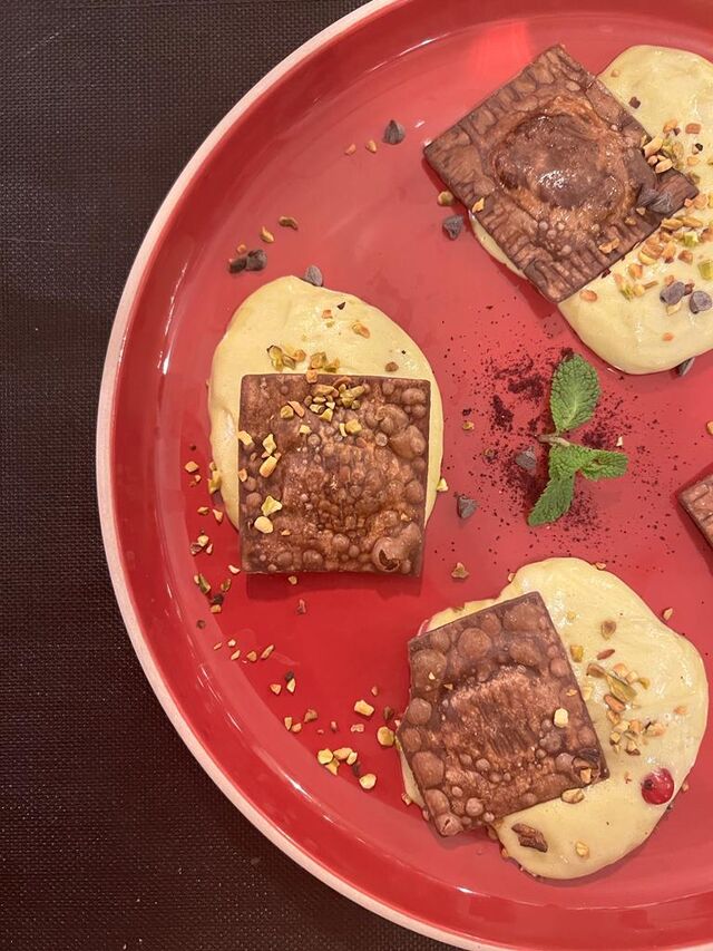 ravioli al cioccolato ripieni di arancia e ricotta