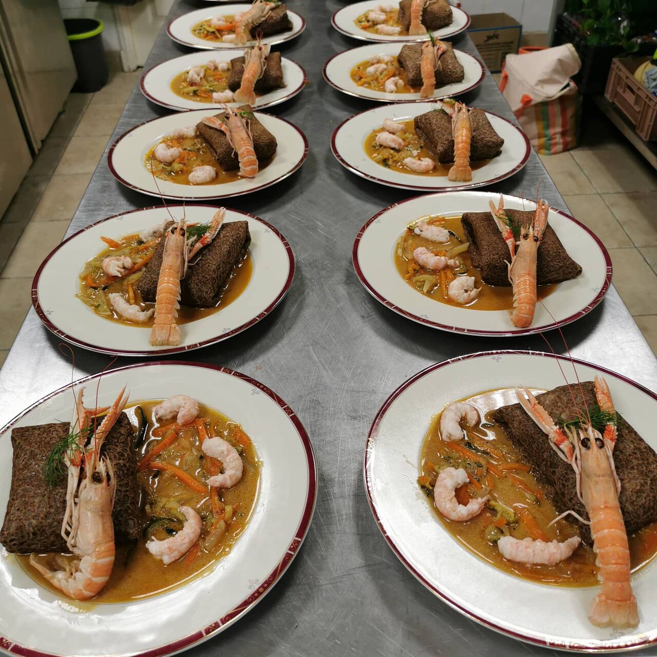 Papillote de poisson, sauce cidre, langoustine 