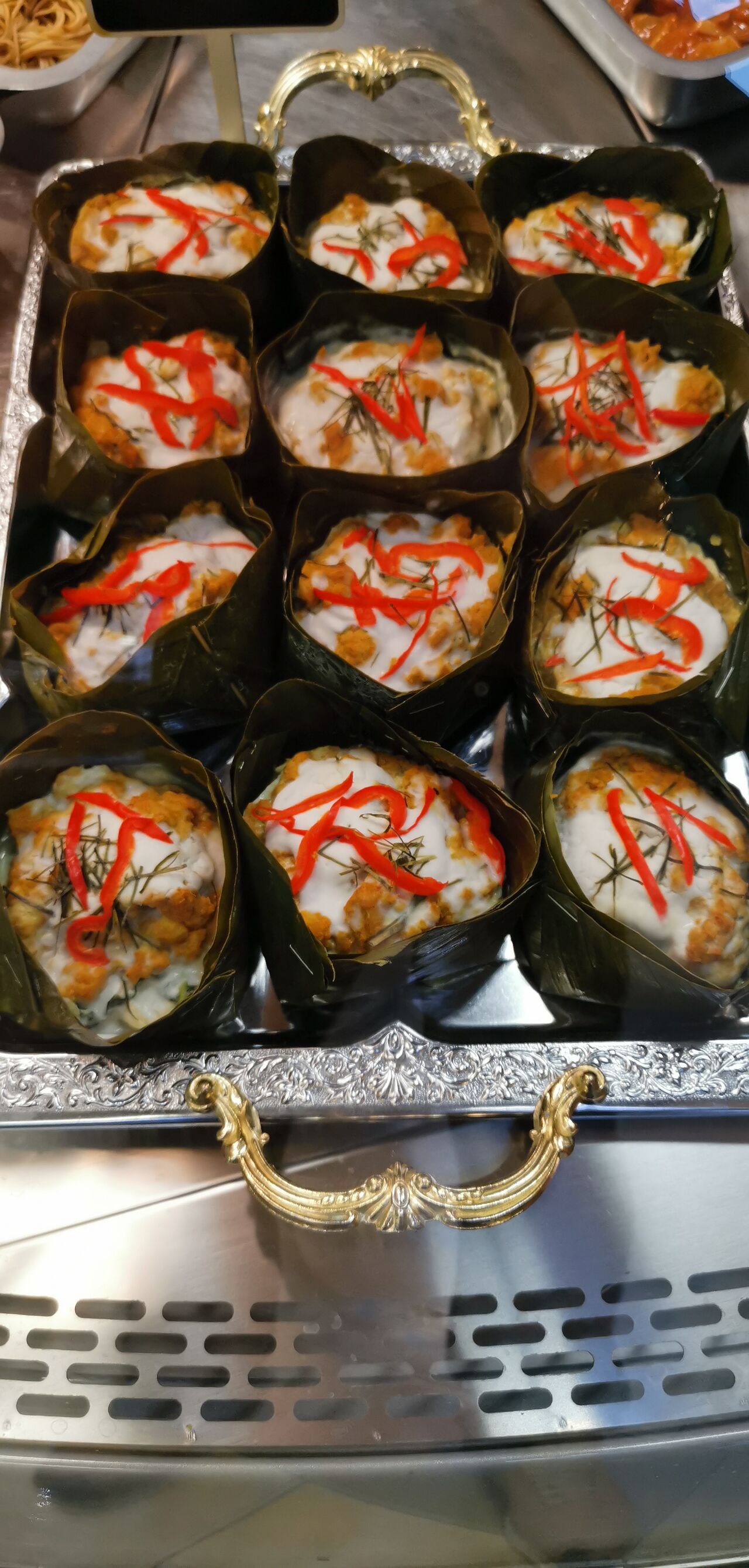 Amok du poisson avec le lait coco