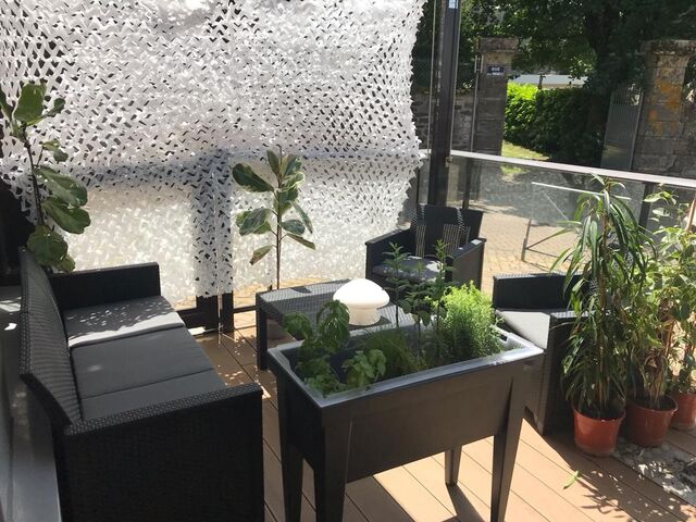 Le salon d'extérieur à profiter par tout temps