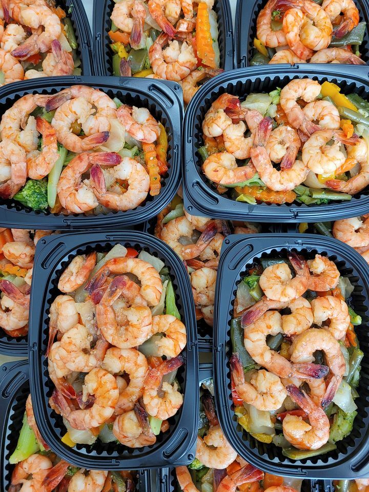 Kong asian food
Crevettes sautées aux légumes tout juste emballées