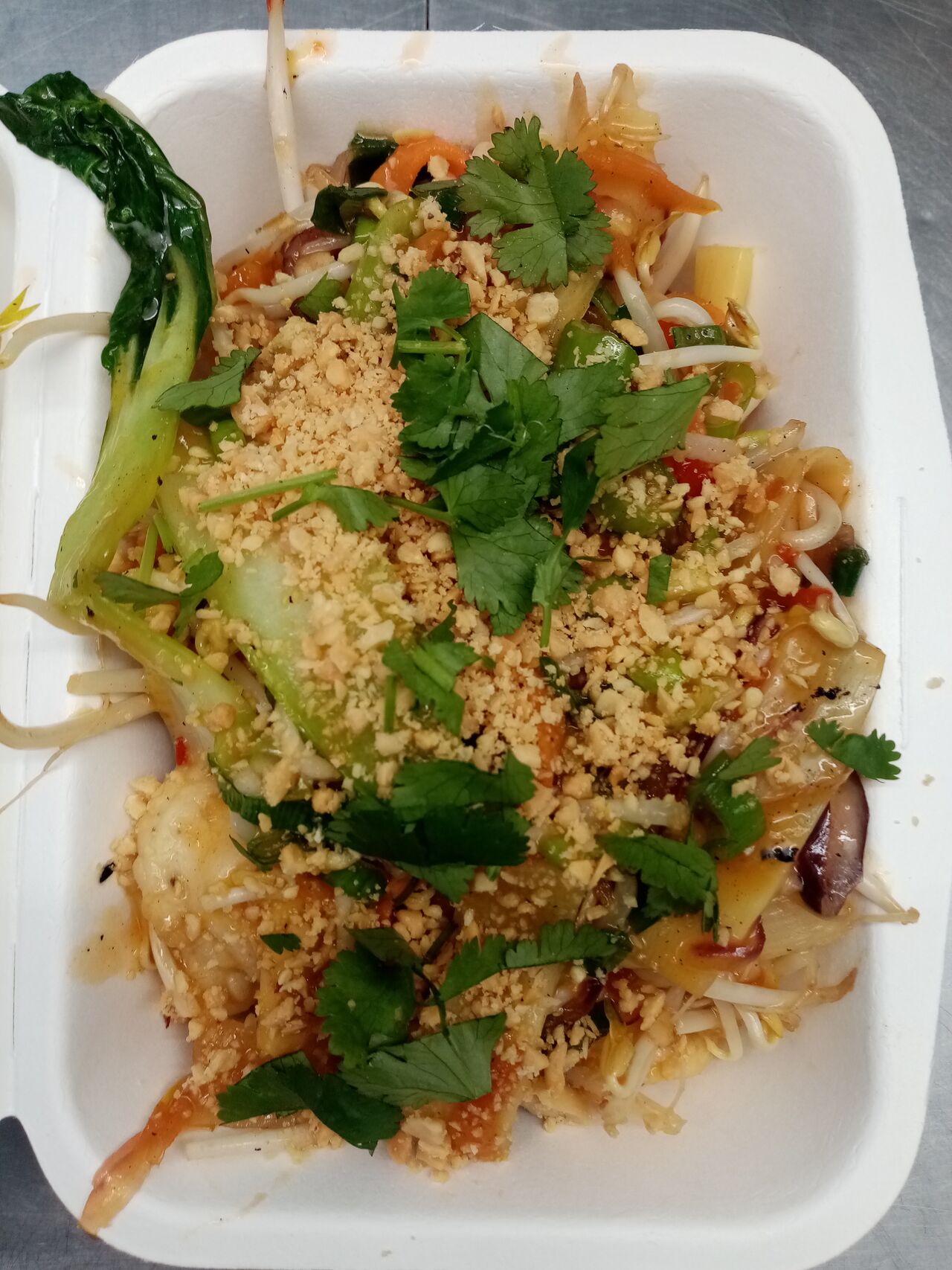 Wok e rie sauté aux légumes et au porc