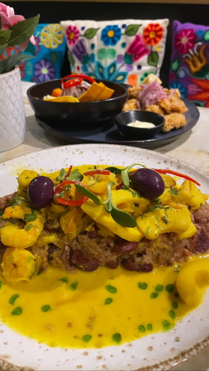 Tacu tacu con picante de mariscos