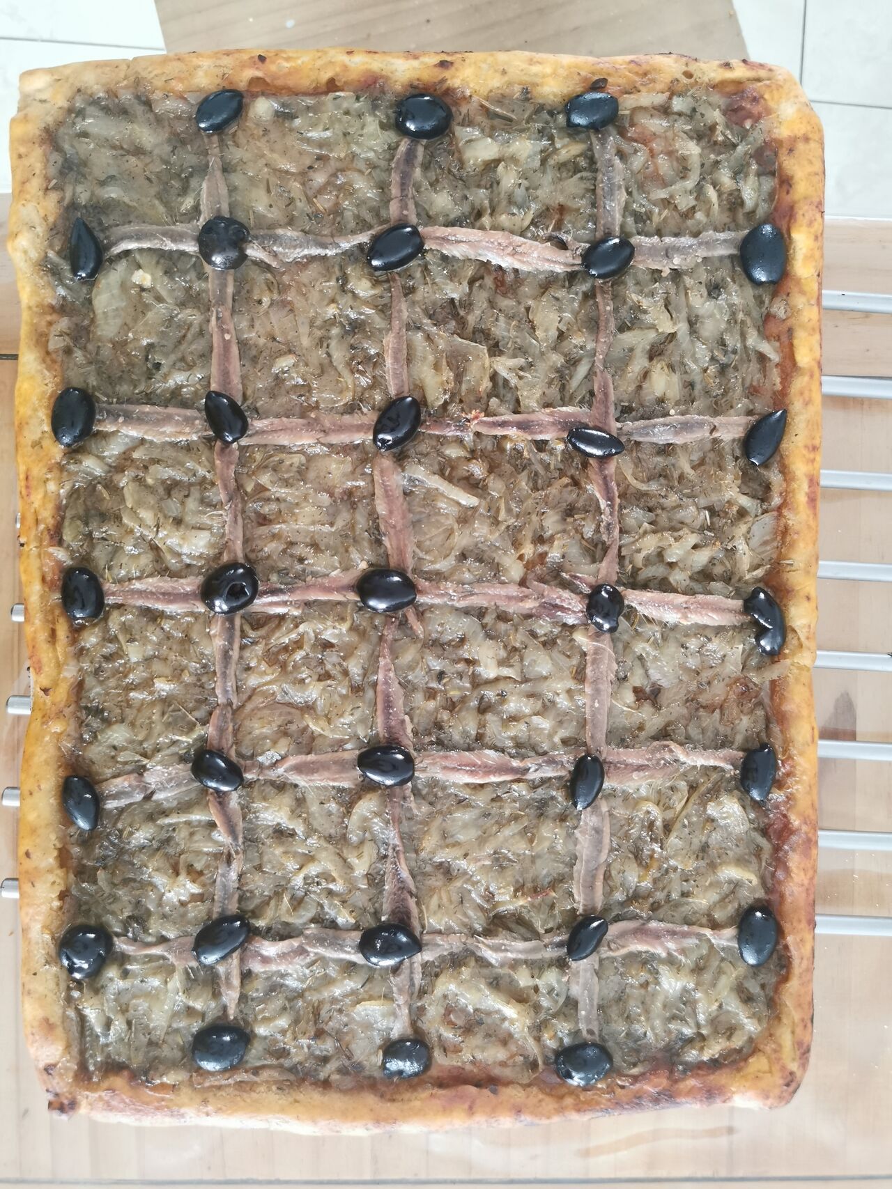 1/2 plaque de pissaladière 12 euros