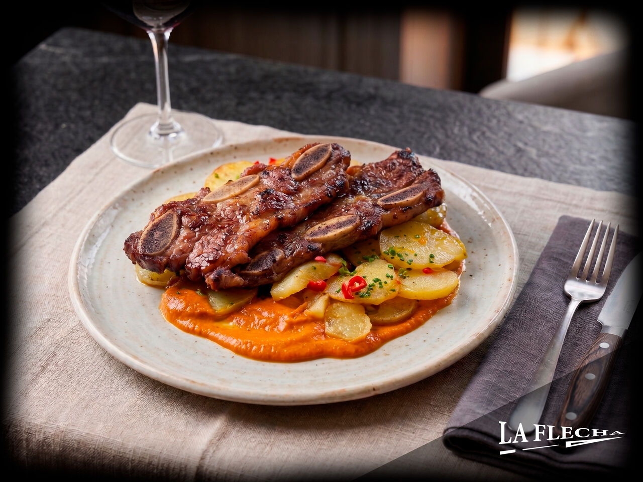 Churrasco con patatas en salsa