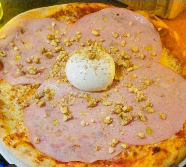 Bei uns ist Pizza eine Verführung...