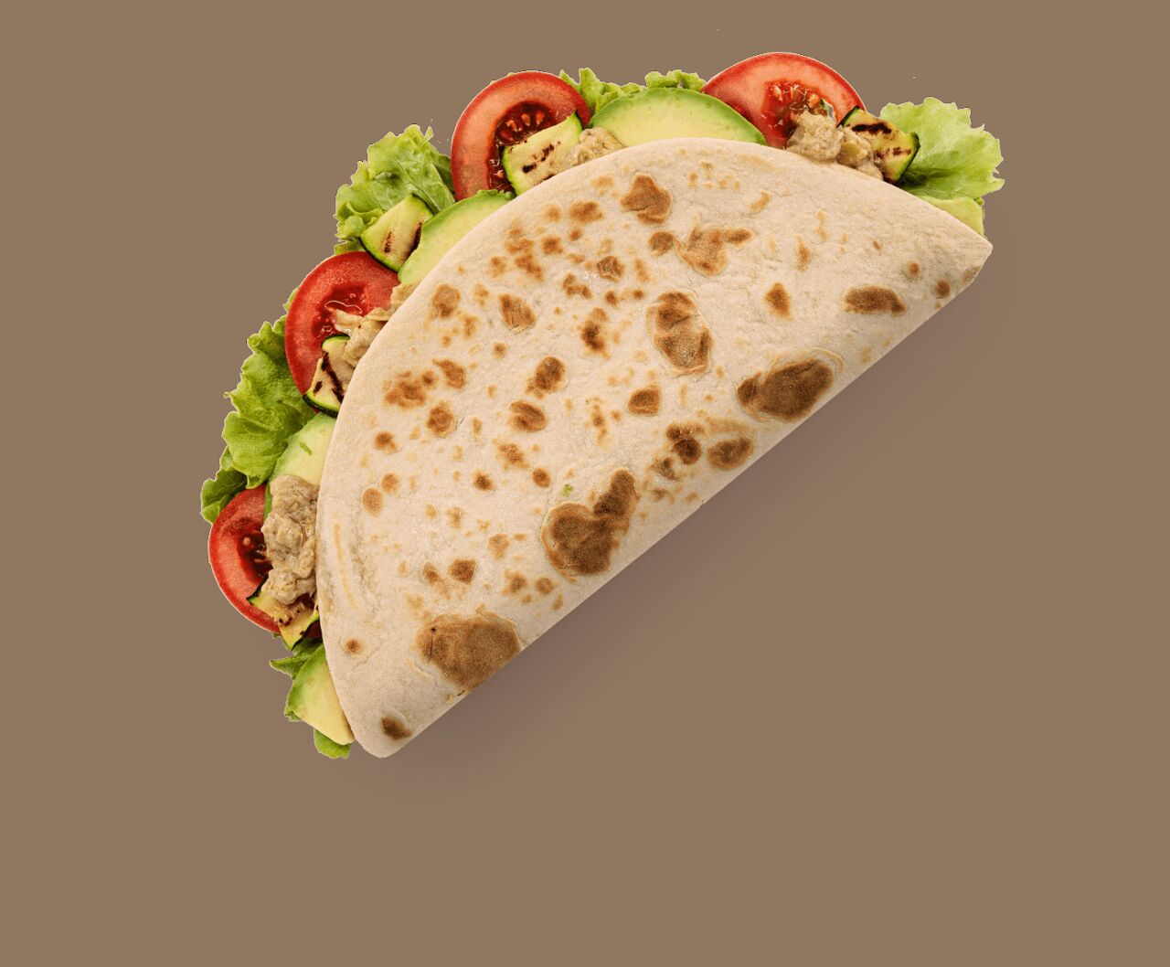 Avocado, gegrillte Zucchini, Salat, Tomate und Kichererbsencreme