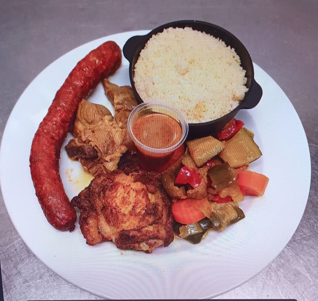 Couscous (poulet merguez) 8.90€ la part