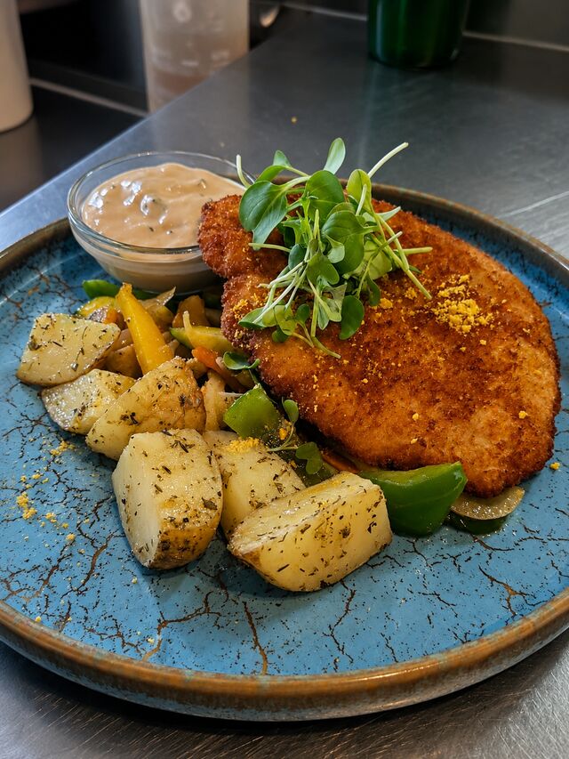 Escalope de cerdo con salsa chapiñones