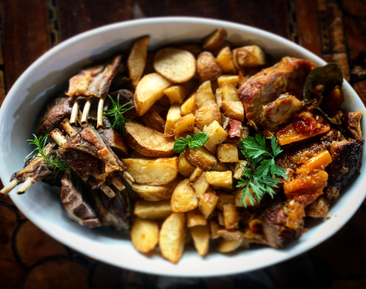 Homemade chef-style lamb and veal baked under the bell